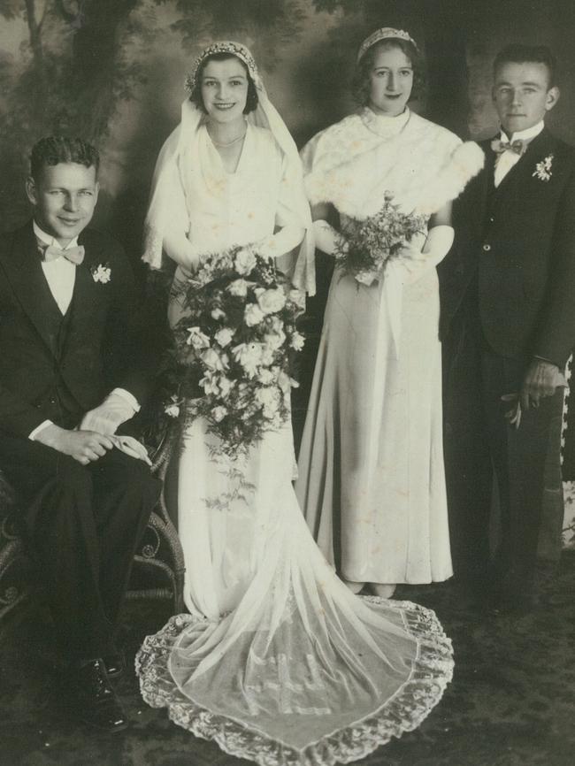 Bridal gown from 1930s featuring embroidered reverse swastika