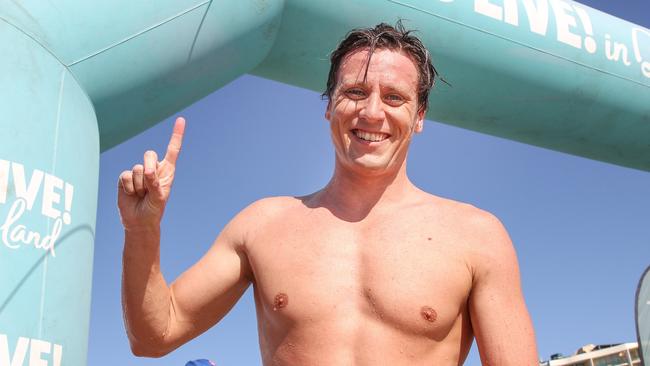 Niuck Sloman after winning the mass swim on the Sunshine Coast.