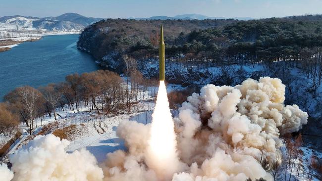 North Korea successfully test-fires an intermediate-range, solid-fuel ballistic missile at an undisclosed location. Picture: KCNA/AFP