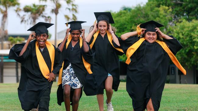 Ludmilla Primary Students Keanu Fejo, Ellena Fejo, Ava Anderson and Valerie Alford as Young scholars graduate from Children’s University in Darwin. Picture: Glenn Campbell