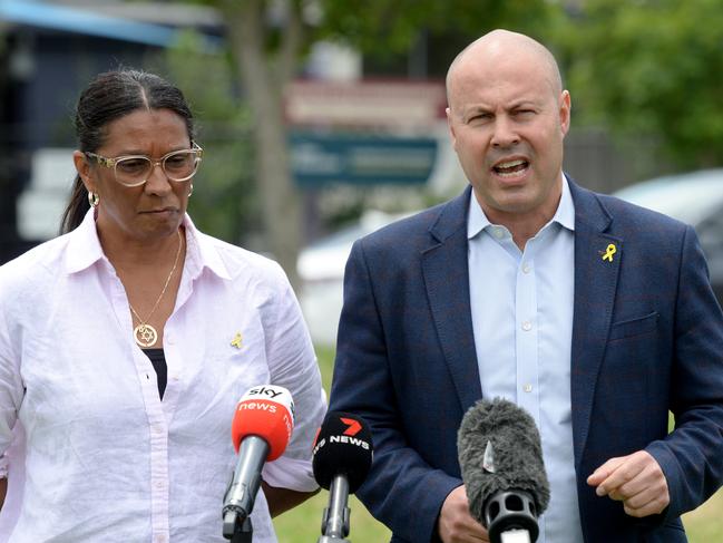 Former Federal Treasurer Josh Frydenberg and former Labor MP Nova Peris speak to the media after the arson attack. Picture: Andrew Henshaw