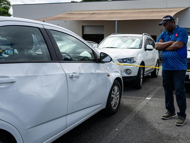 Edward Conteh inspects the damage after last nights vandalism attack in The Salvation Army carpark on Hoare St. Picture Emily Barker.