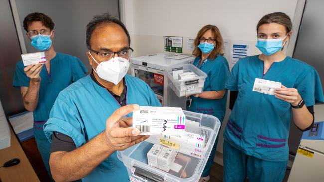 GPS warn thousands of vaccine batches are about to expire. Dr Mukesh Haikerwal pictured his crew at the Altona North Respiratory Clinic Ryan Mitchell, Jenny Klenidis and Chloe Coffin. Picture: Mark Stewart