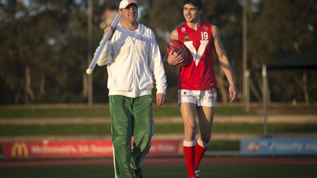 Former pole vault champion Dmitri Markov with his son Oleg, an up and coming young footballer.