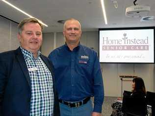 TALKING POINT: Carers Queensland team leader Peter Proctor (left) and Home Instead Client Services representative Andrew McCarthy prepare for the information seminar section at Toowoomba's first death cafe. Picture: Alexia Austin