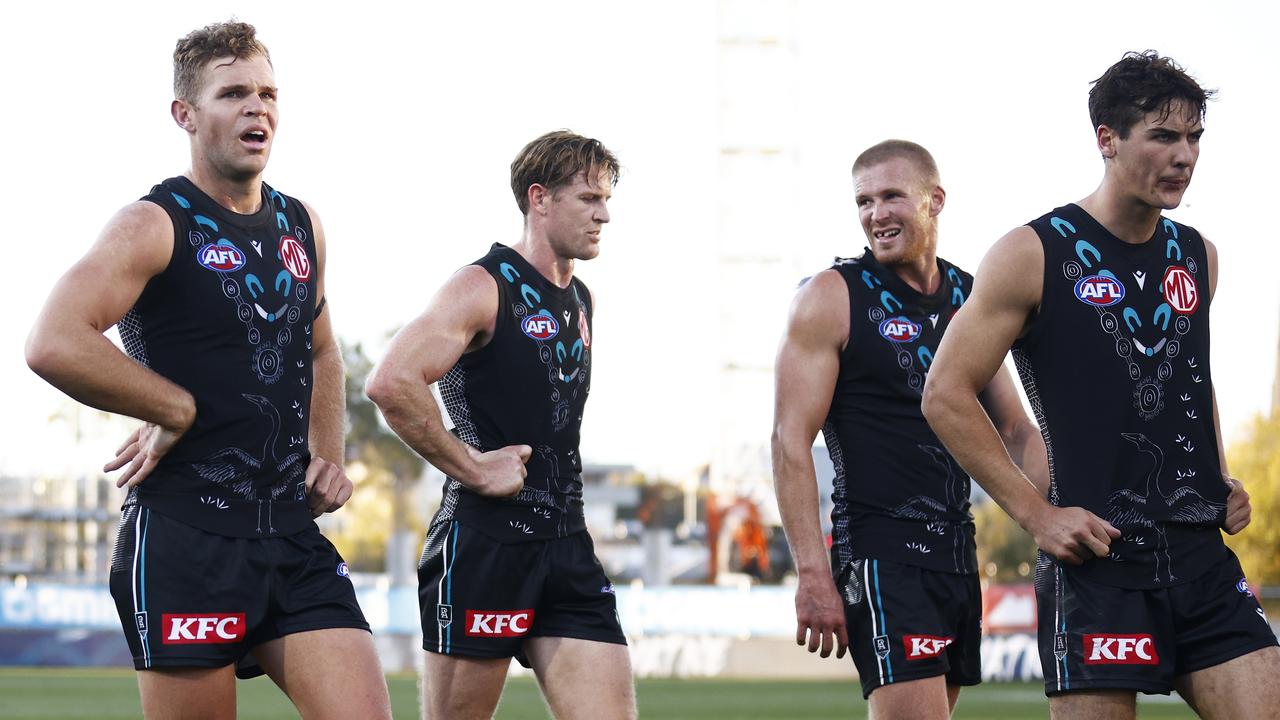 Dan Houston, Tom Jonas, Tom Clurey and Connor Rozee after Port’s 35-point loss. Picture: Daniel Pockett/AFL Photos