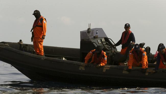 Rescuers search for victims in the waters of Ujung Karawang, West Java. Picture: Achmad Ibrahim/AP