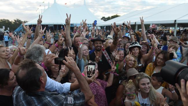 Michael Franti performs out in the general area with crowds at Bluesfest 2018 in Tyagarah near Byron Bay.