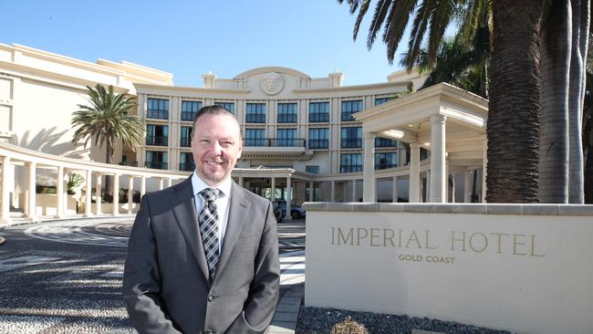 General Manager Richard Clarke with the new Imperial Hotel signage at the hotel formerly known as Palazzo Versace. Picture: Glenn Hampson