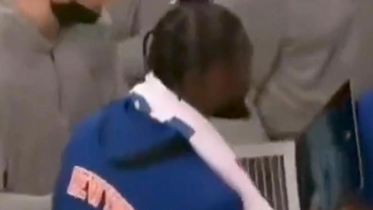 Knicks star Julius Randle slapped away a laptop in a heated clash with an assistant coach.