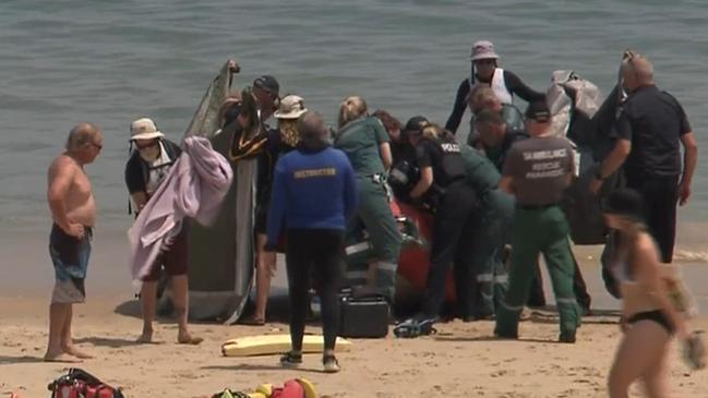 A woman in her 30s has been rushed to hospital with facial injuries after a shark attack near the Port Noarlunga jetty, Adelaide, on Friday afternoon. Picture: 7NEWS