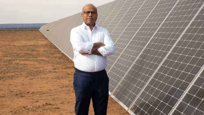 GFG Alliance executive chairman Sanjeev Gupta next to the Cultana solar plant test rig.