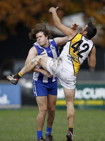 Ovens and King FNL, Round 7, King Valley Kangaroos V Glenrowan Tigers, at Whitfield Recreation Reserve. Zack Carmody, 42, King Valley Kangaroos and Christopher Sussyer, 42, Glenrowan Tigers. Picture: Yuri Kouzmin