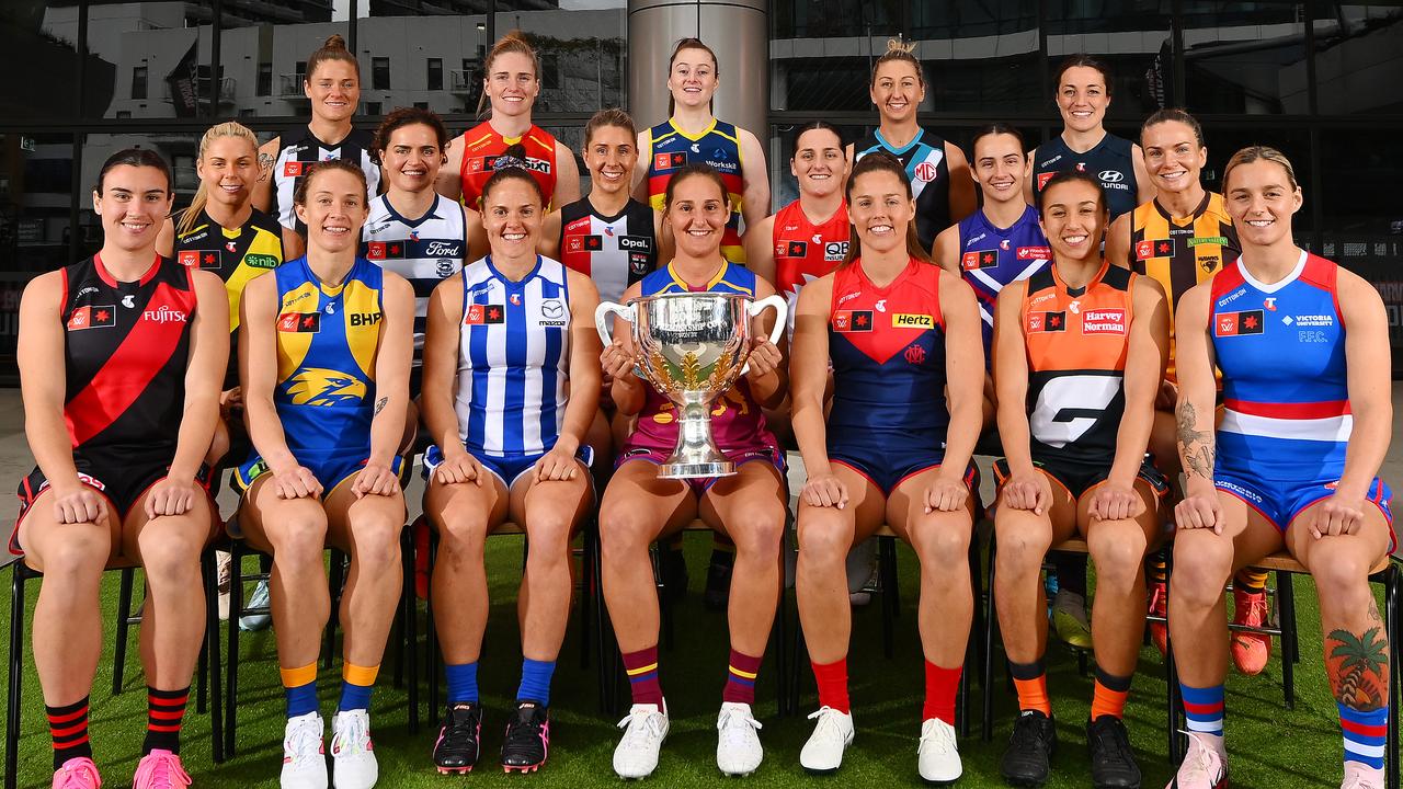 MELBOURNE, AUSTRALIA - AUGUST 20: Back row: Bri Davey of the Magpies, Tara Bohanna of the Suns, Sarah Allan of the Crows, Janelle Cuthbertson of the Power and Kerryn Peterson of the Blues. Middle row: Katie Brennan of the Tigers, Meg McDonald of the Cats, Hannah Priest of the Saitns, Lucy McEvoy of the Swans, Ange Stannett of the Dockers and Emily Bates of the Hawks. Front row: Bonnie Toogood of the Bombers, Emma Swanson of the Eagles, Emma Kearney of the Kangaroos, Bre Koenen of the Lions, Kate Hore of the Demons, Rebecca Beeson of the Giants and Deanna Berry of the Bulldogs pose during 2024 AFLW Captain's Day at Marvel Stadium on August 20, 2024 in Melbourne, Australia. (Photo by Morgan Hancock/Getty Images)