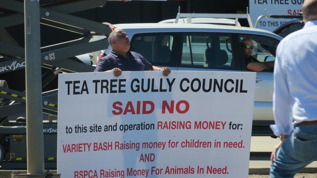 Emmanouel Pishas confronts protesters. Picture: Jason Katsaras