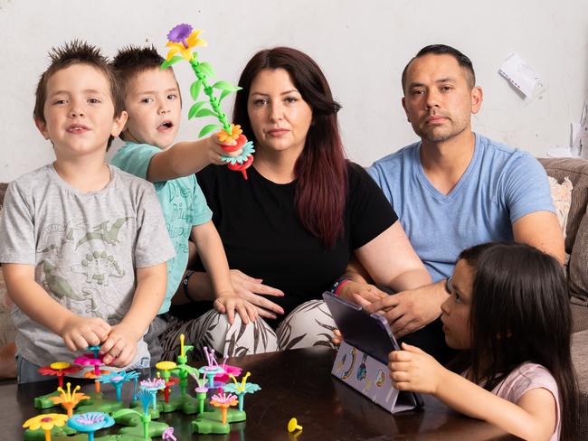 January 8, 2025: Photo: L-R Leo (5), Max (5), Ellen, Charles and Emily (7) Mitchell.  Max, one of Ellen's children has had to wait over a year for an assessment at the Women's and Children's Hospital - Child Development Unit. Picture: Tim Joy