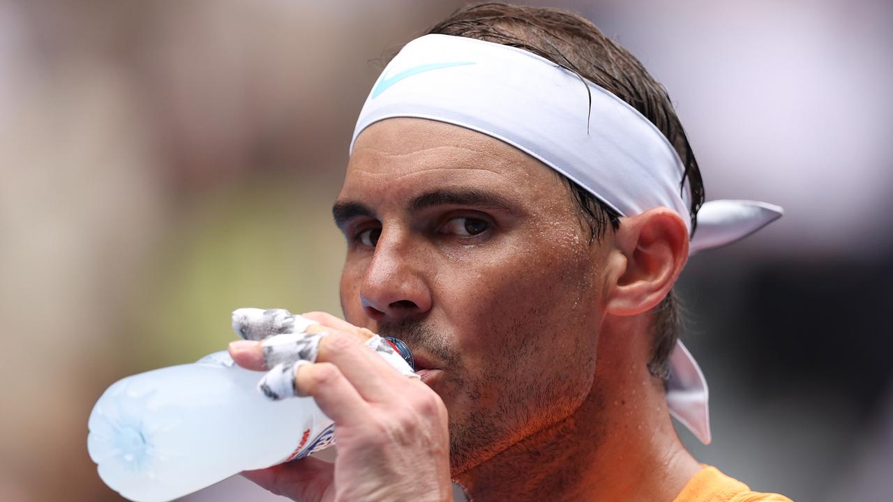 Rafael Nadal has a drink on Monday.