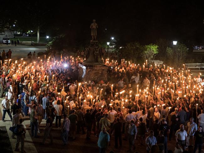 Several hundred white nationalists and white supremacists carrying torches marched in a parade through the University of Virginia campus chanting White lives matter! You will not replace us! and Jews will not replace us! Picture: Evelyn Hockstein/For The Washington Post via Getty Images