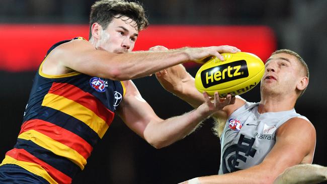 Mitch McGovern marks over Liam Jones.