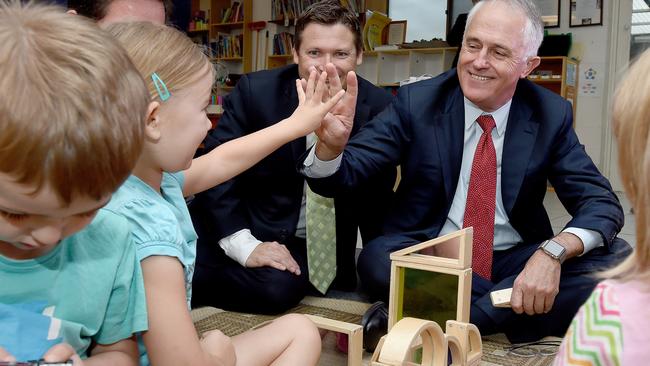 Malcolm Turnbull with kids at Mooringie World of Learning centre in Plympton with Minister Matt Williams. Photo: Naomi Jellicoe