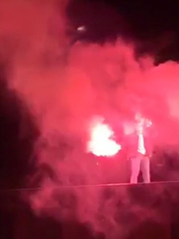 Flares being set off on the roof of a house. Picture: Supplied