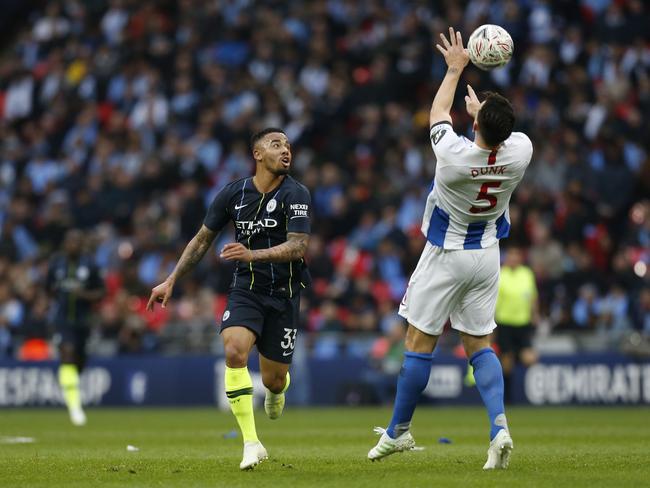 Manchester City's Brazilian striker Gabriel Jesus (L) vies with Brighton's English defender Lewis Dunk. Picture: Ian Kington/AFP