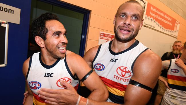 BIG HELP: Cam Ellis-Yolmen (right) celebrates the Crows’ two-point win against Melbourne last week with mentor Eddie Betts. Picture: DAN PELED (AAP).