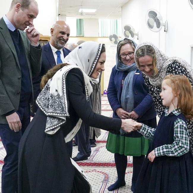 Princess Catherine speaks with Jess Jorden, 6, Jess's mum Esther and Inma Lopez from the Red Cross as she and Prince William visit Hayes Muslim Centre on March 9, thanking those involved in the aid effort to help communities affected by the devastating earthquakes in Turkey and Syria. Picture: Arthur Edwards/WPA Pool/Getty Images