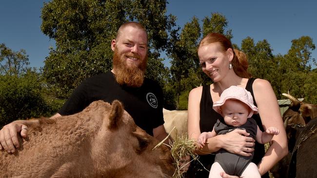 Dan and Marianne Robson with Scarlet, 6 months, with Latte the camel and other animals at Maridan's Menagerie at Oak Valley. Picture: Evan Morgan