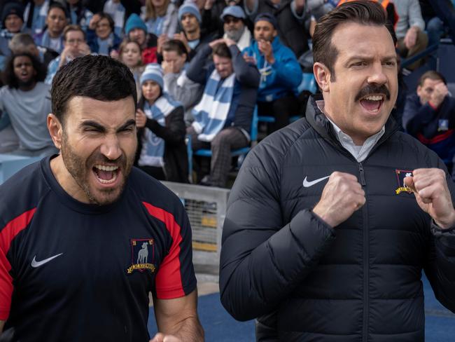 Jason Sudeikis as Ted Lasso (centre) with co-stars and co-writers Brett Goldstein (left) and Brendan Hunt (right).