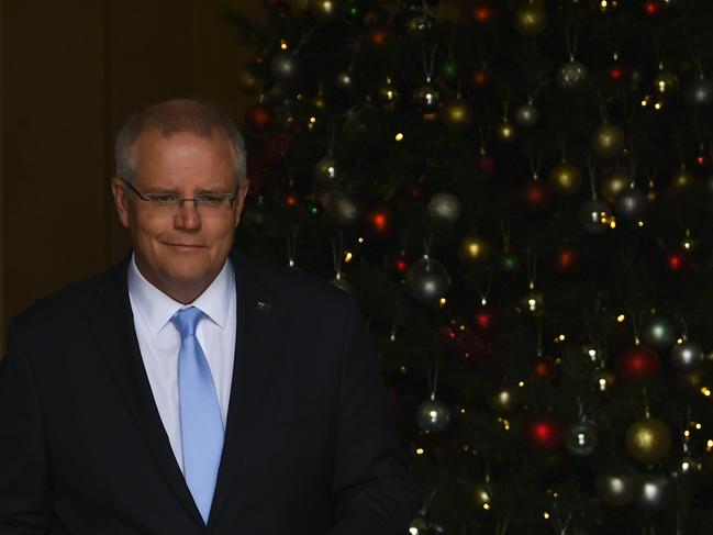 Australian Prime Minister Scott Morrison arrives to speak to the media during a press conference at Parliament House in Canberra, Tuesday, November 27, 2018. (AAP Image/Lukas Coch) NO ARCHIVING