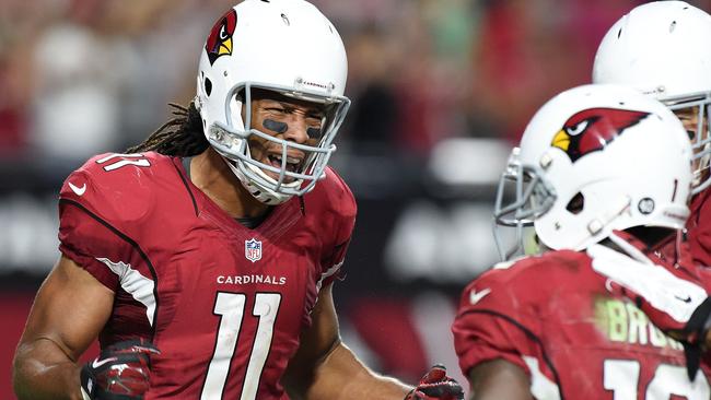 Wide receiver Larry Fitzgerald #11 celebrates with John Brown #12.