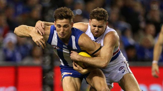 Shaun Atley feels the pressure from Crozier. Picture: AAP