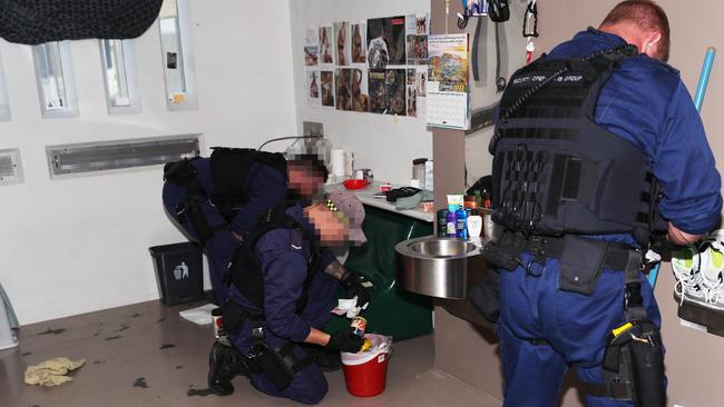 Officers from Security Operations Group (SOG) undertake a targeted covert contraband raid at Shortland Correctional Centre, Cessnock, on December 11 2021. Picture: Peter Lorimer