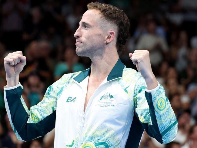 Thomas Gallagher celebrates on the podium during the medal ceremony for the Men's 50m Freestyle S10 final. Picture: Getty Images