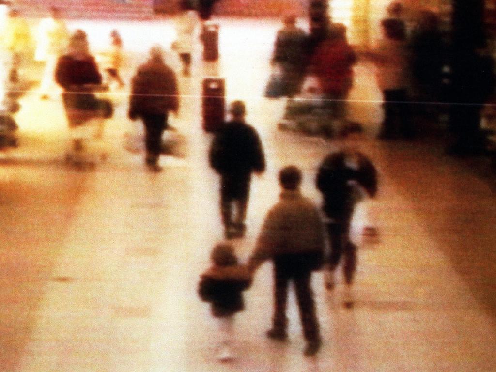 The boys were caught on camera leading the toddler away in 1993. Picture: Getty Images