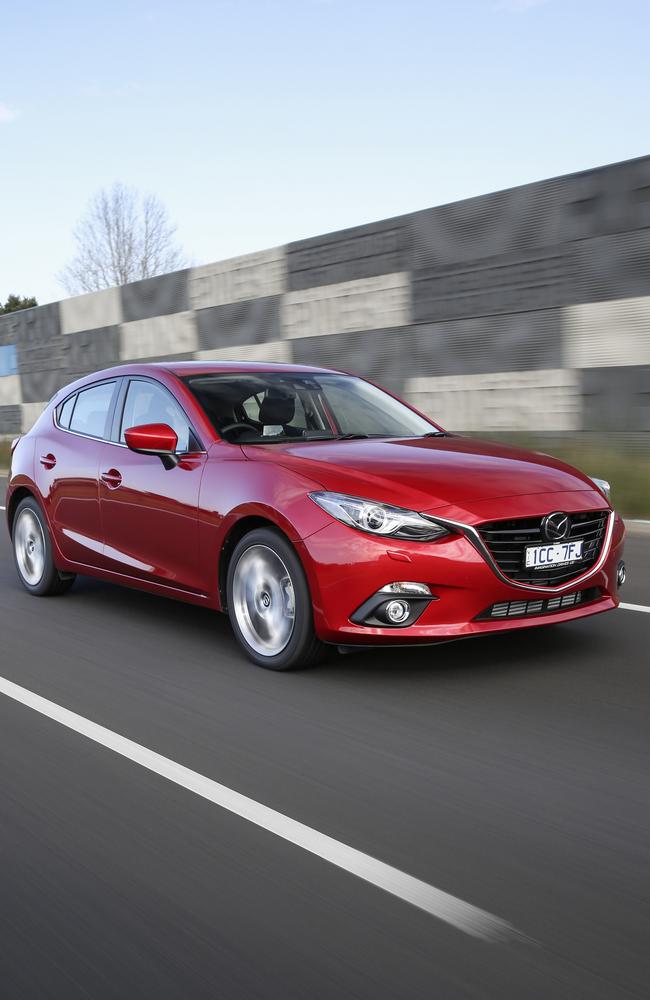 Overtaken ... The Mazda3 ended the Holden Commodore’s record 15-year winning streak in 2011 and 2012.