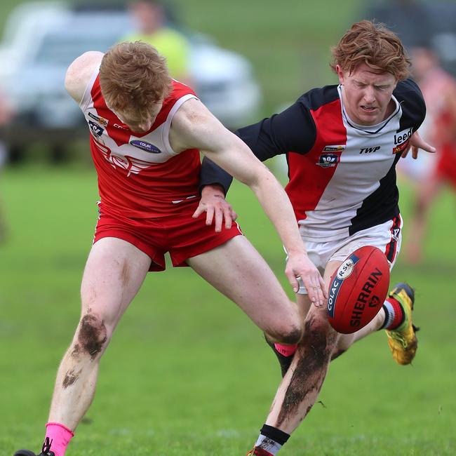 Alvie’s Alex Williamson leads Birregurra’s Liam Cunnington to the ball.