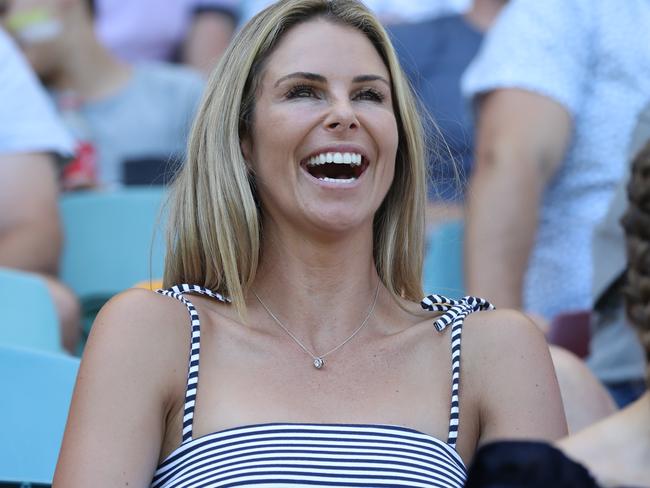 Candice Warner in happier times as a cricket WAG, enjoying play at the Gabba in Brisbane. Picture: Annette Dew