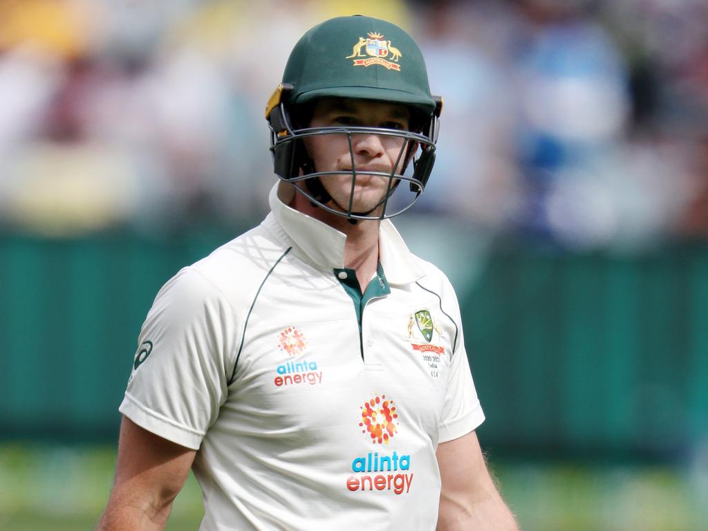 Tim Paine walks off the MCG.