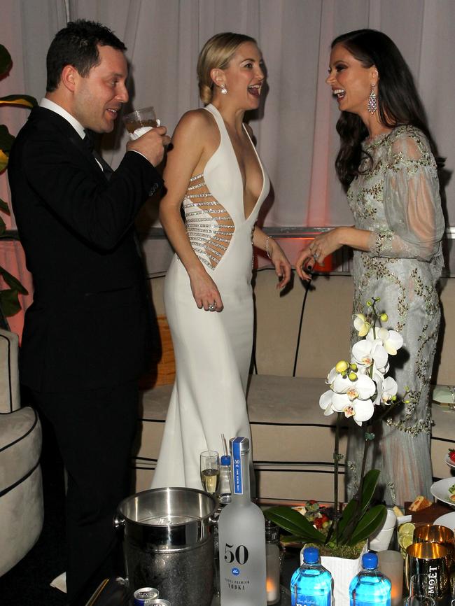 Having a giggle ... Kate Hudson and designer Georgina Chapman.