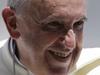 Pope Francis smiles as he leaves St. Peter's Square following his weekly general audience, at the Vatican, Wednesday, June 4, 2014. (AP Photo/Gregorio Borgia)