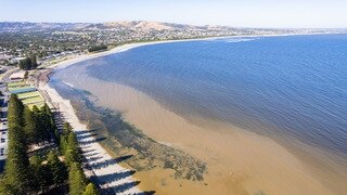 Aerial images of flood water mixing with seawater at Victor Harbor. Picture: John Laundy