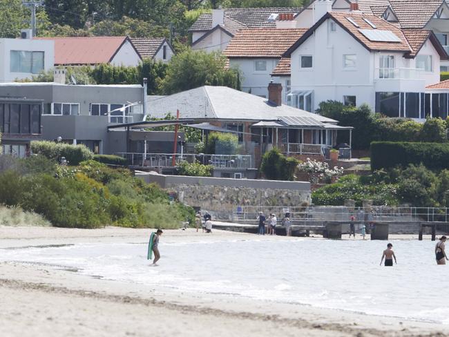 Nutgrove Beach at Sandy Bay with warning signs of water pollution caused by only partially treated effluent flowing into the River Derwent.  Picture: Nikki Davis-Jones