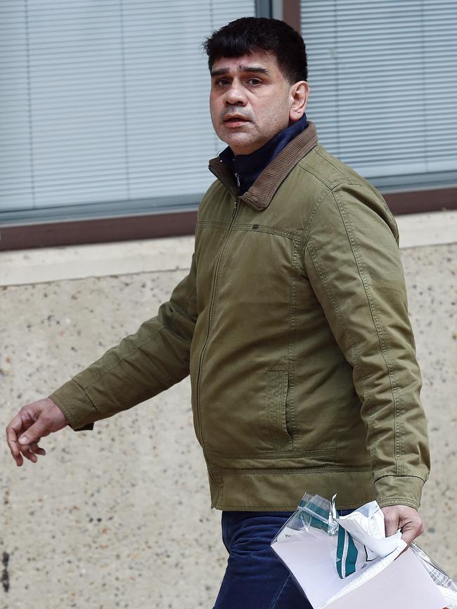 Ashok Bhatia, 52, leaving Surry Hills Police Centre after being granted bail. Picture: Sam Ruttyn