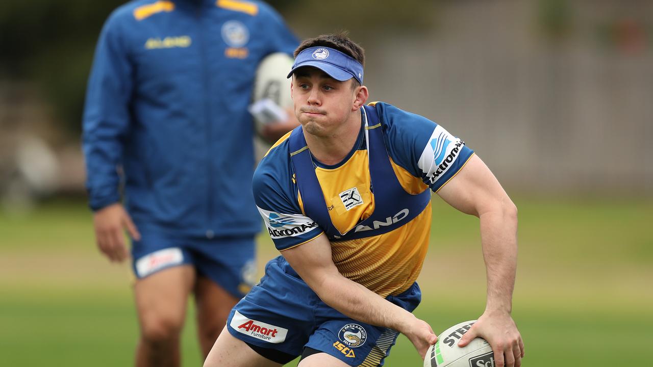 Premiership-winning hooker Michael Ennis says the re-signing of Reed Mahoney (pictured) is a priority for Eels coach Brad Arthur.