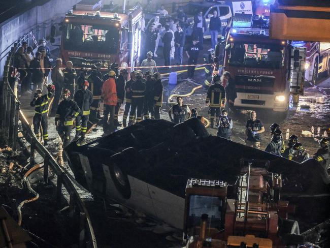 Rescue workers flood the scene of the tragic accident. Picture: Getty Images