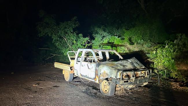 The burnt out Hilux which police allege Mr Peckham used to run over ducks and ram through gates. Picture: Emily Broomham.