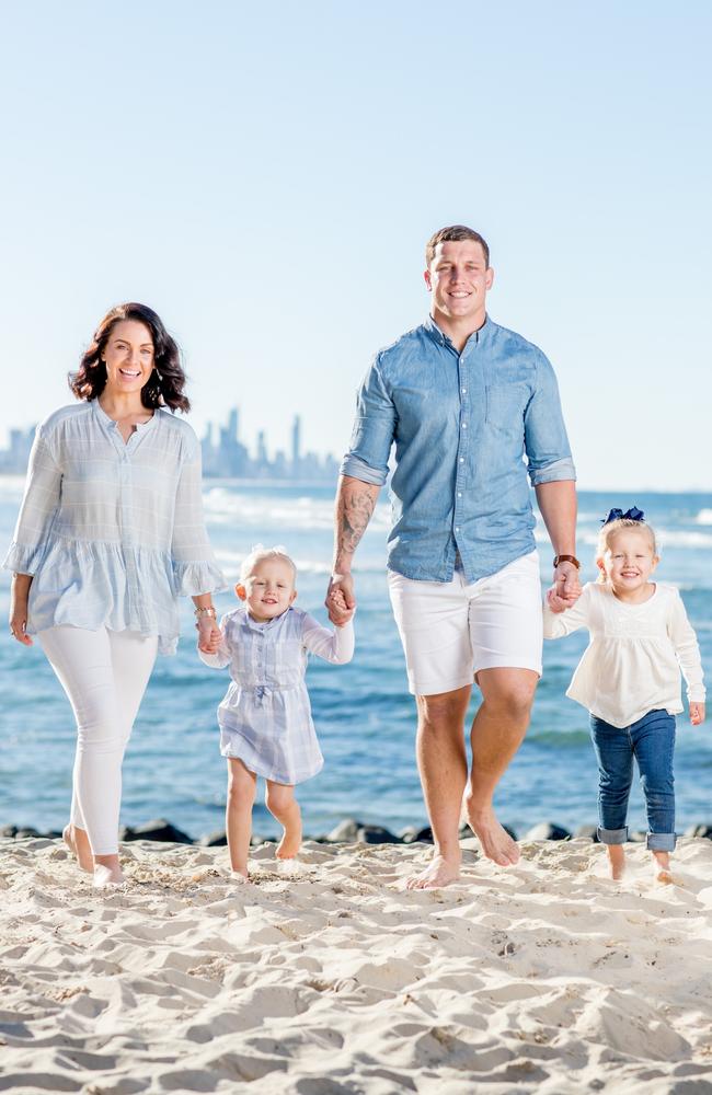 Courtney Thorpe and Jarrod Wallace with Lara and Peyton at home on the Gold Coast. Picture: Luke Marsden