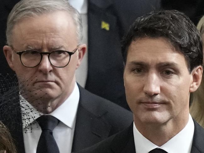 LONDON, ENGLAND - SEPTEMBER 19: Canada's Prime Minister Justin Trudeau, front right, and his wife Sophie, front left, walk with Australia's Prime Minister Anthony Albanese, center, left, as the coffin of Queen Elizabeth II is carried out of Westminster Abbey, after the State Funeral of Queen Elizabeth II at Westminster Abbey on September 19, 2022 in London, England.  Elizabeth Alexandra Mary Windsor was born in Bruton Street, Mayfair, London on 21 April 1926. She married Prince Philip in 1947 and ascended the throne of the United Kingdom and Commonwealth on 6 February 1952 after the death of her Father, King George VI. Queen Elizabeth II died at Balmoral Castle in Scotland on September 8, 2022, and is succeeded by her eldest son, King Charles III. (Photo by Frank Augstein - WPA Pool/Getty Images)